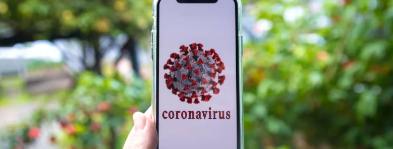 iphone with coronavirus image on screen